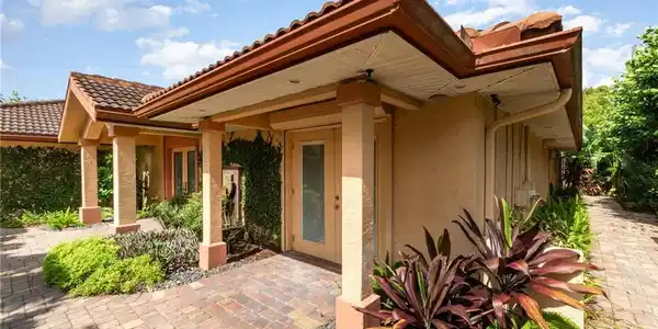 Image 4: View of front of home with a patio