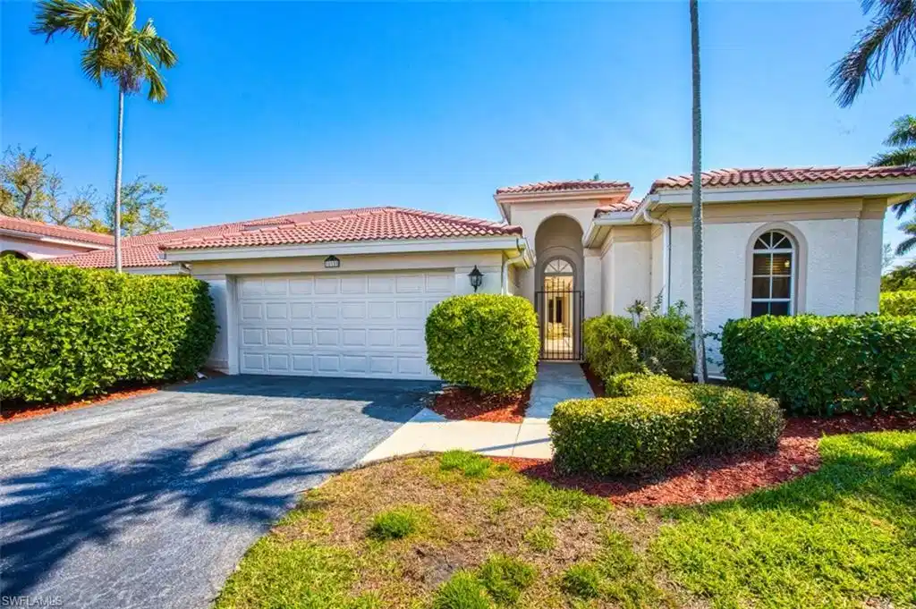 Image 1: Mediterranean / spanish-style house with a garage