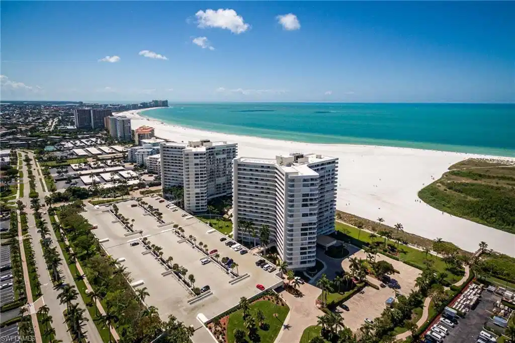 Image 1: Birds eye view of property featuring a view of the beach and a water view