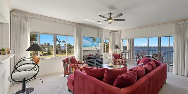 Image 4: Living room featuring Marina, Beach and wide River views from everywhere