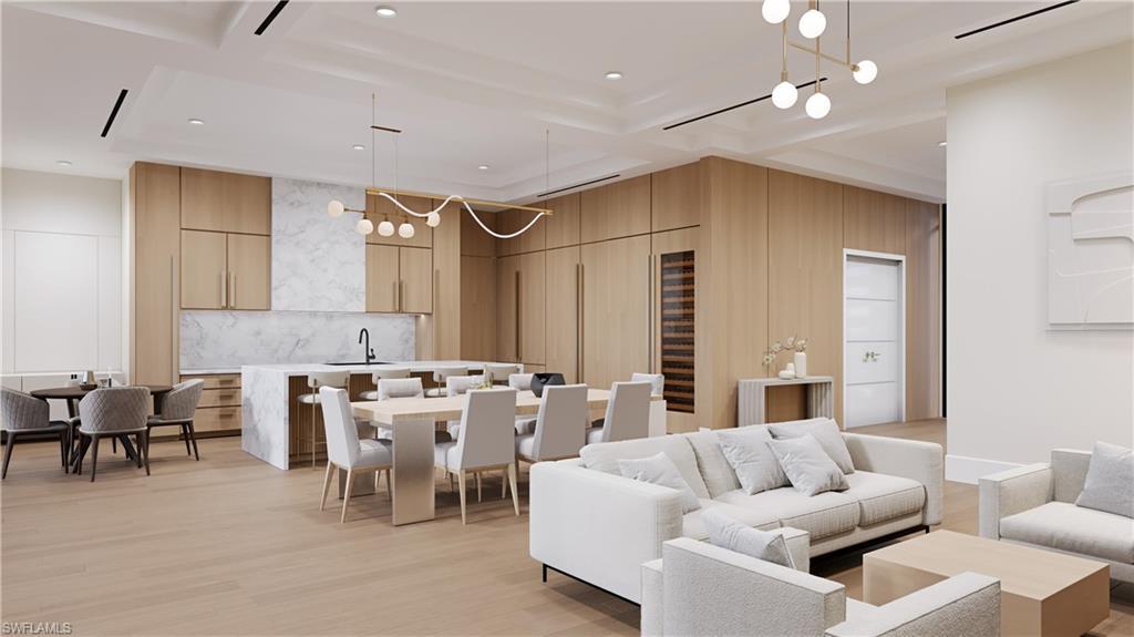 Image 3: Architectural rendering. Plans and finishes can be customized. Living area with a chandelier, light wood-style floors, and recessed lighting.