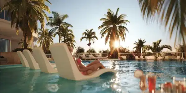 Image 4: View of pool at dusk