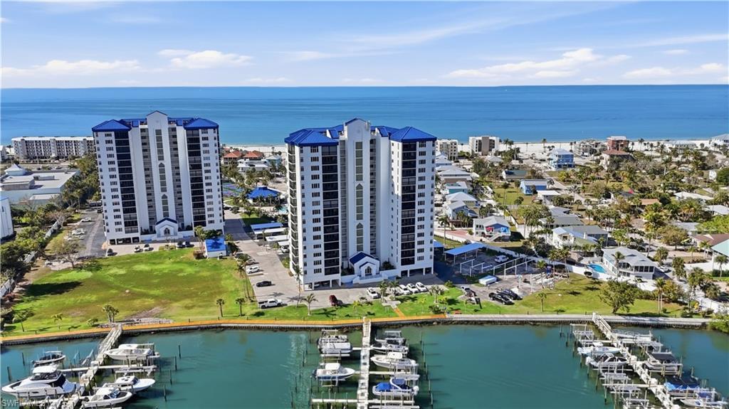 Image 4: Drone / aerial view of a large body of water and numerous boat docks - Virtually Edited Image
