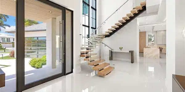 Image 3: Foyer with a high ceiling and recessed lighting