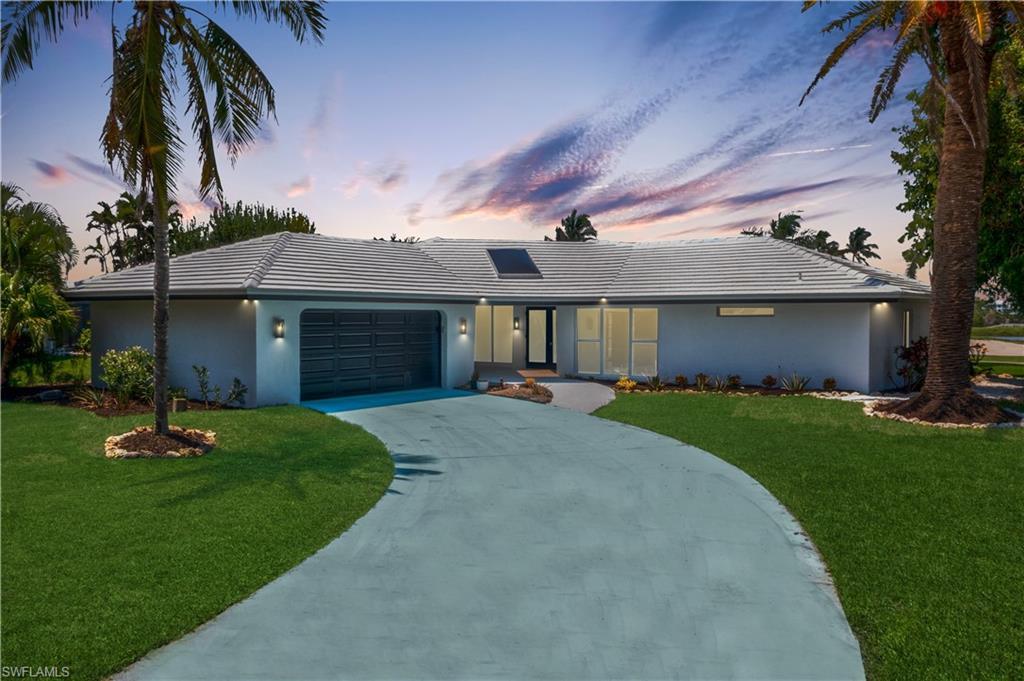 Image 2: Super extended  driveway with plenty of room for parking!  This gorgeous home was just remodeled - all done with permitting and great attention to detail!  Designed both for living and also for entertaining, this home is spectacular!