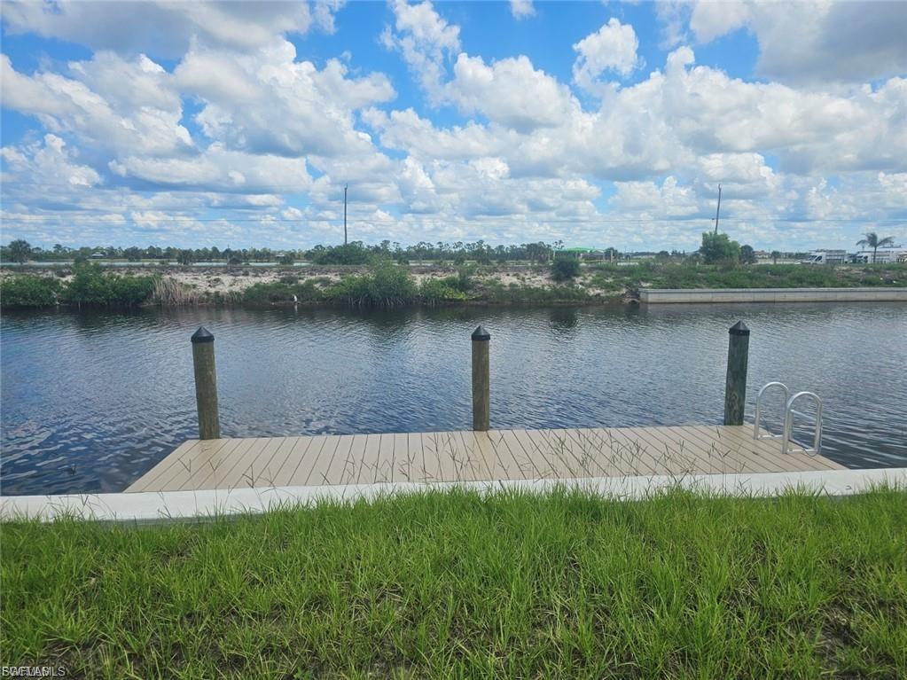 Image 1: Dock area featuring a water view