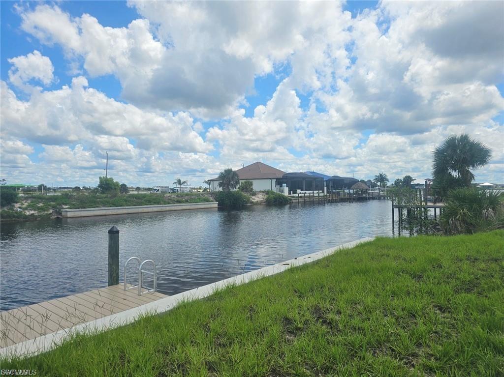 Image 4: Dock area featuring a water view