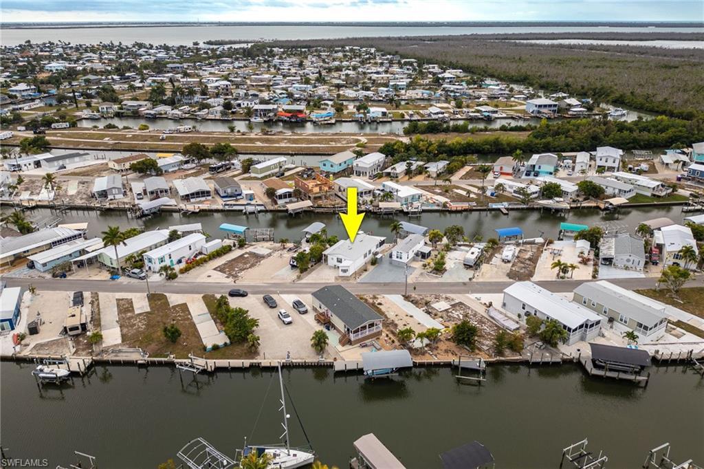 Image 3: Drone / aerial view showing direct boat access