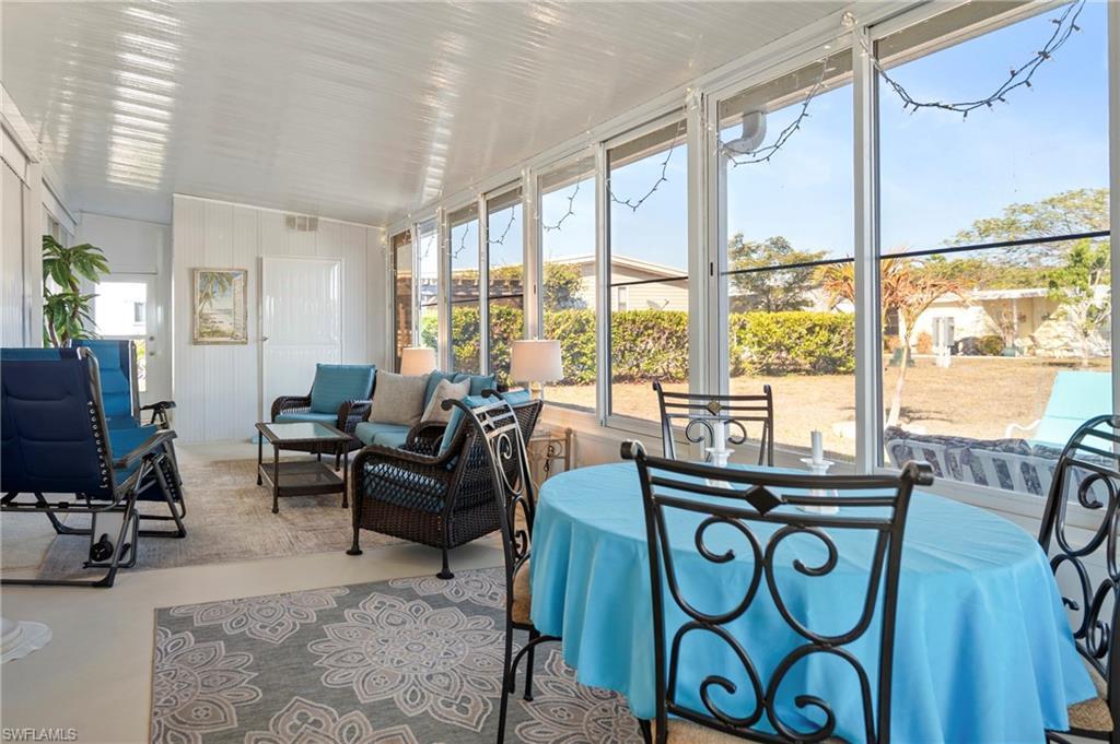 Image 2: Sunroom with outdoor furniture