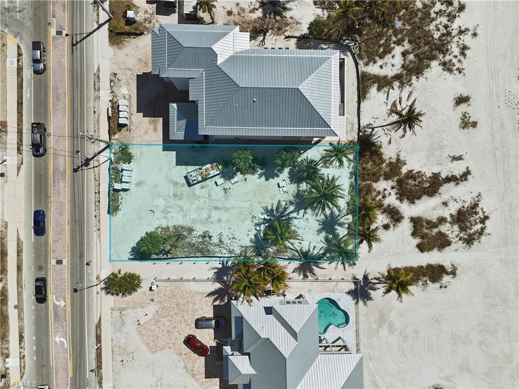 Image 1: View of subject property with a pool area