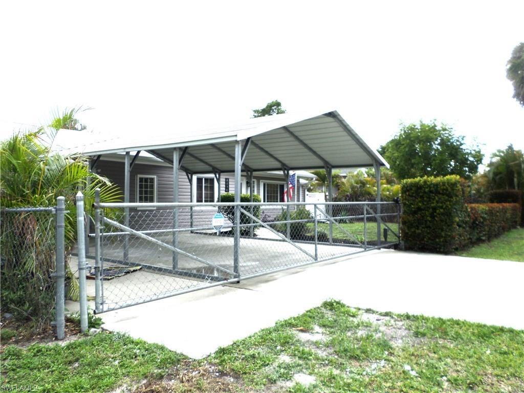 Image 3: Double Over Size Attached Carport With Cement Driveway.