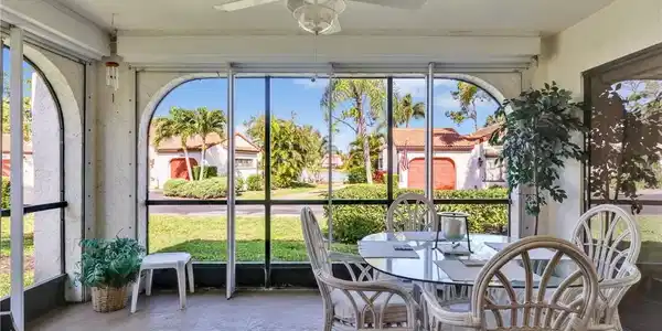 Image 4: Covered lanai looking to lake