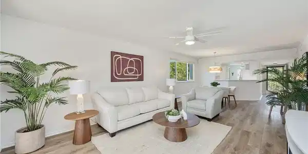 Image 2: Living room with a ceiling fan and light wood finished floors