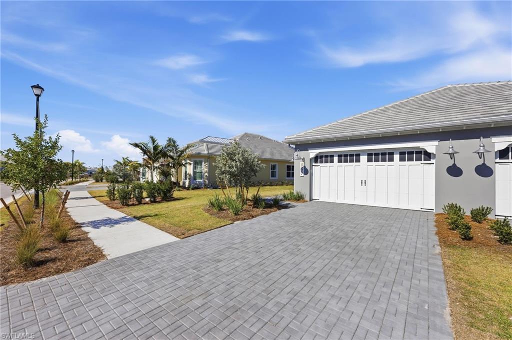 Image 2: 2-Car Garage with spacious driveway