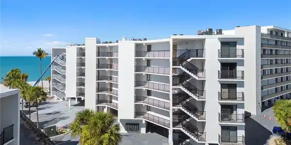 Image 3: View of apartment building / complex featuring a water view