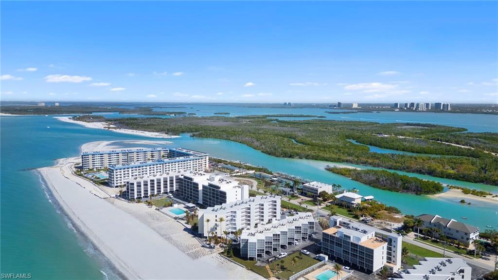 Image 4: View of urban area with expansive beach