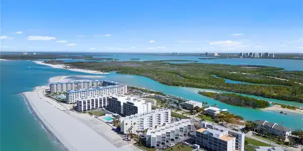 Image 4: View of urban area with expansive beach