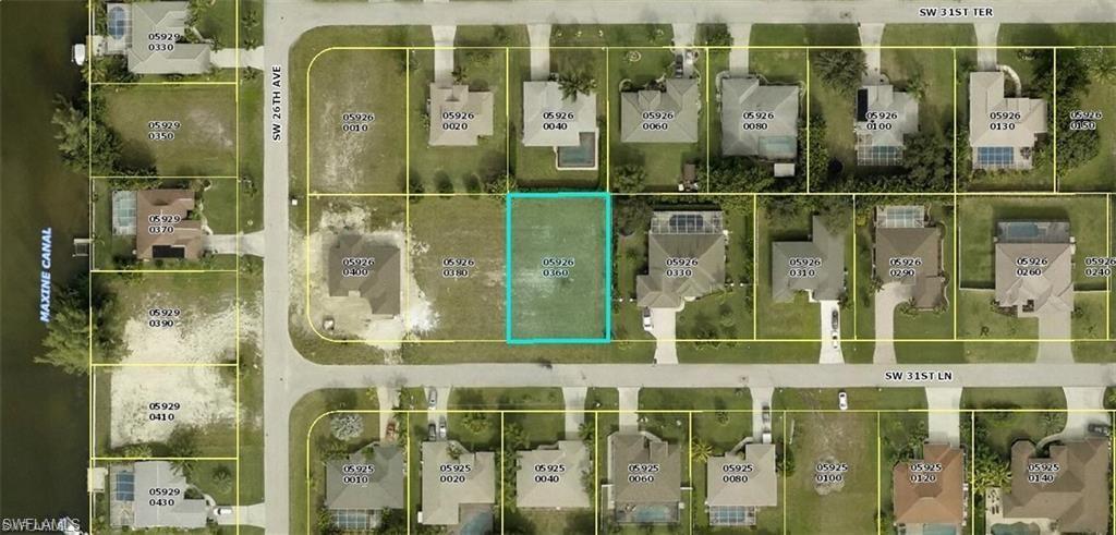 Image 1: Aerial view of property's location featuring property parcel outlined