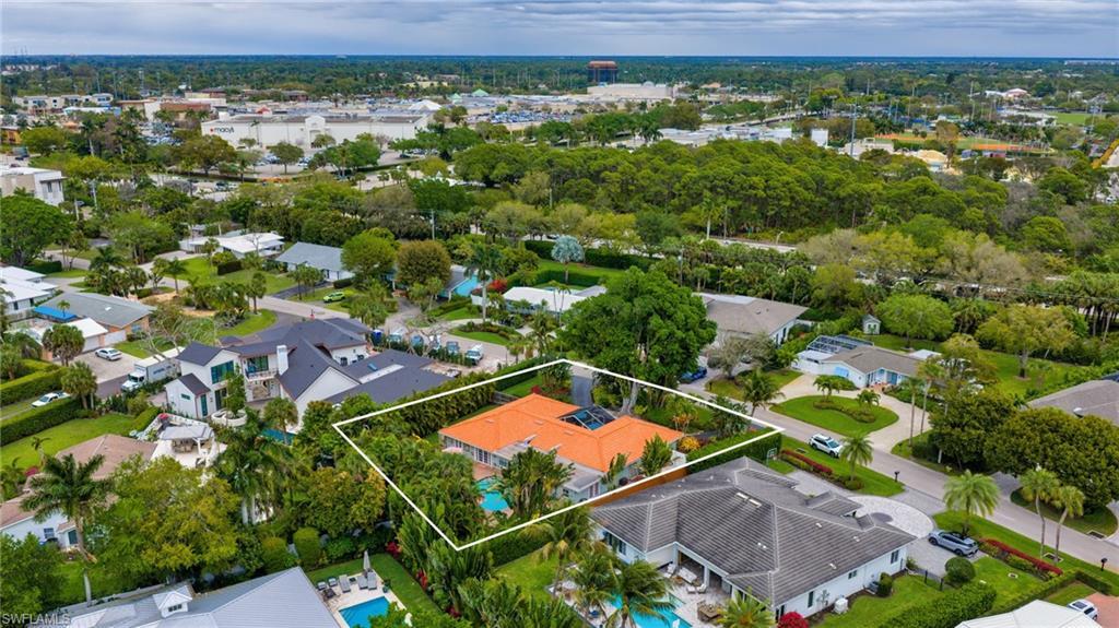 Image 4: Aerial perspective of suburban area with property parcel outlined