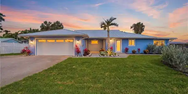 Image 2: Front of home with evening lighting