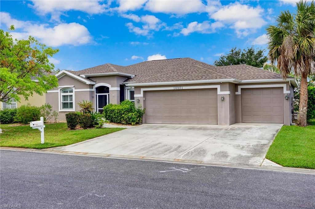 Image 3: Single-story residence featuring a two-car garage, stucco exterior, and a shingle roof