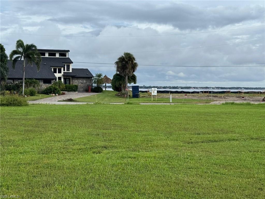 Image 1: View of grassy yard
