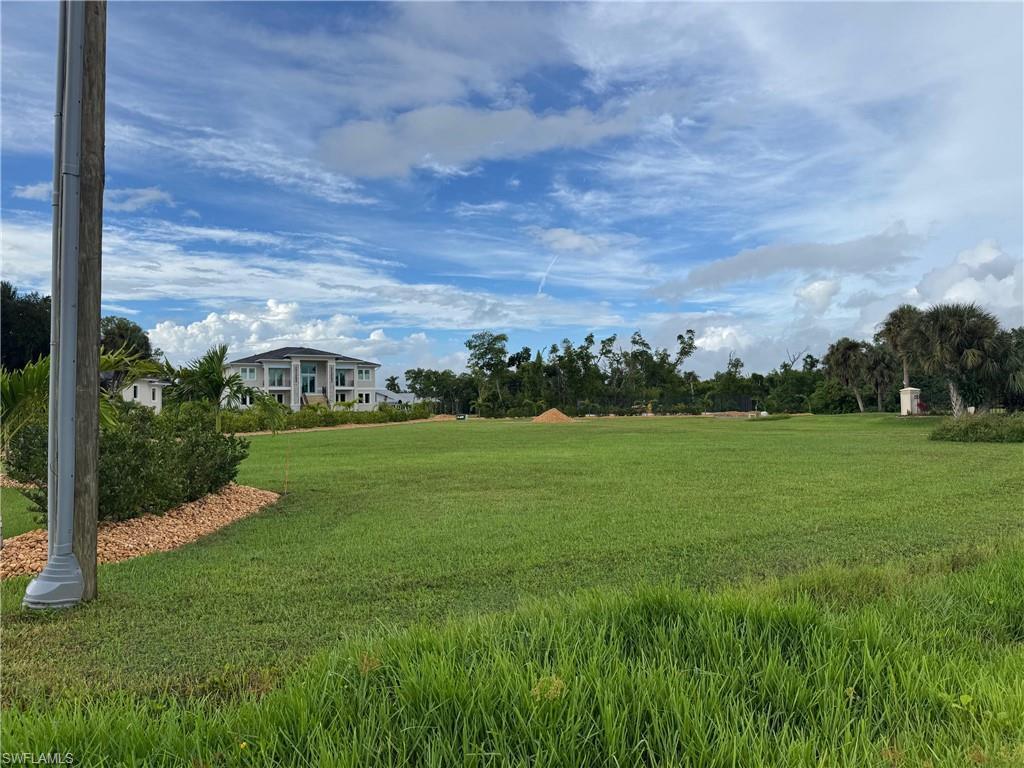 Image 2: Surrounding community with a yard