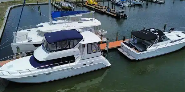 Image 3: Dock with a water view and view of marina
