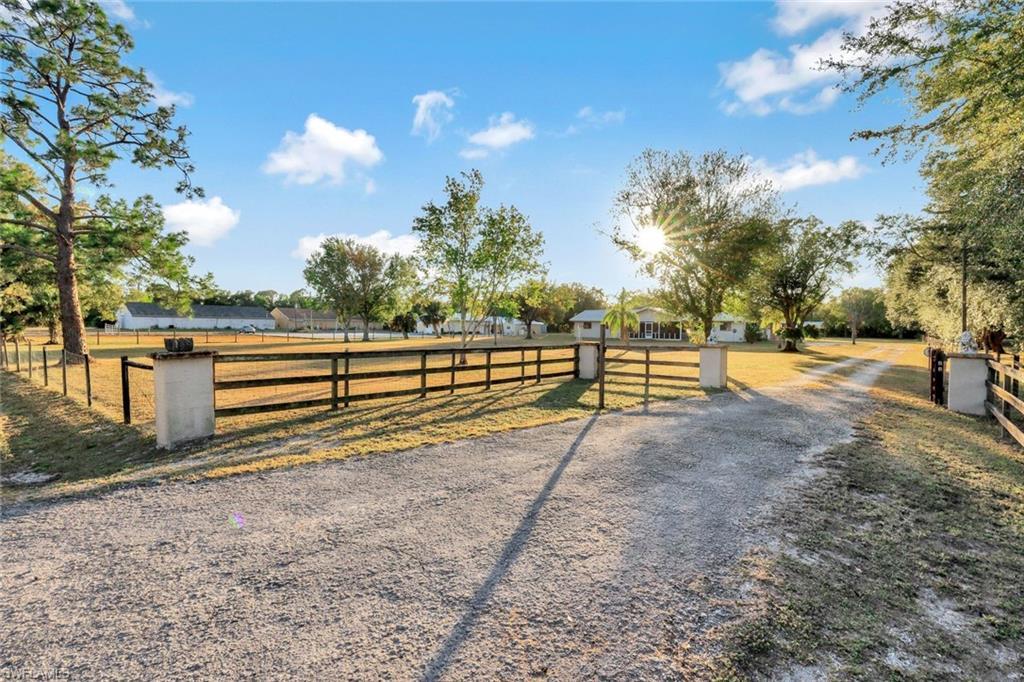 Image 3: Gated entrance to property with keypad.