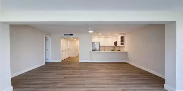 Image 2: Unfurnished living room featuring light wood-type flooring and ceiling fan