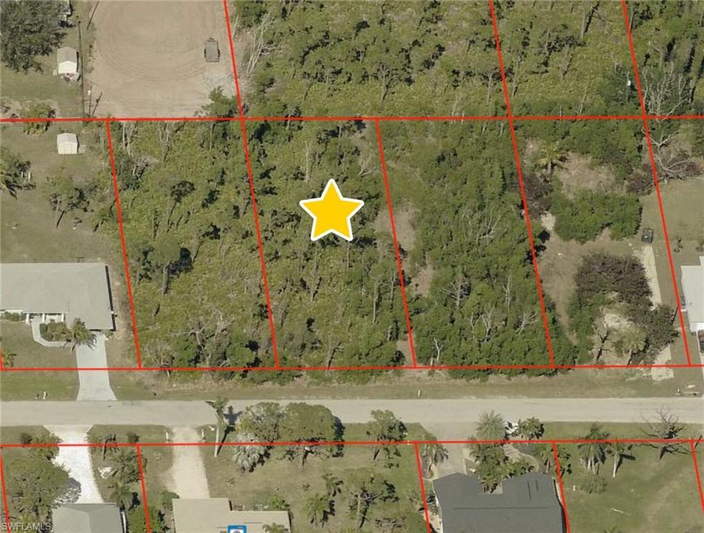 Image 2: Aerial view of property's location featuring property boundaries highlighted