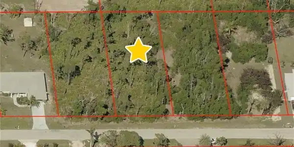 Image 2: Aerial view of property's location featuring property boundaries highlighted
