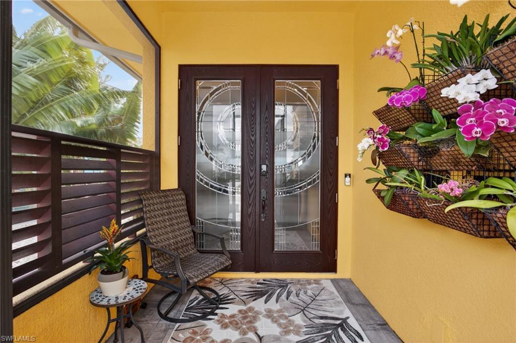 Image 3: Front Entry has that a live Orchid display!