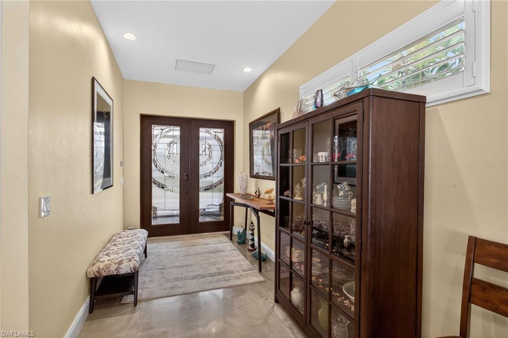Image 4: Bright and welcoming front entry.