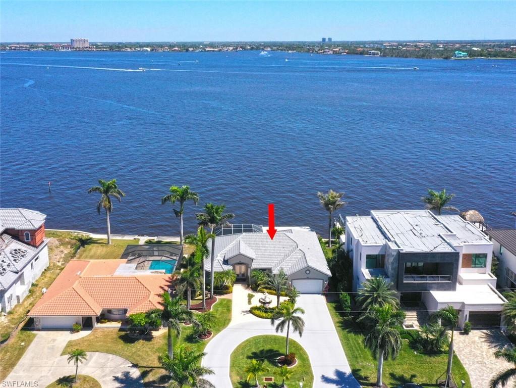 Image 1: AERIAL OF HOME ON RIVER