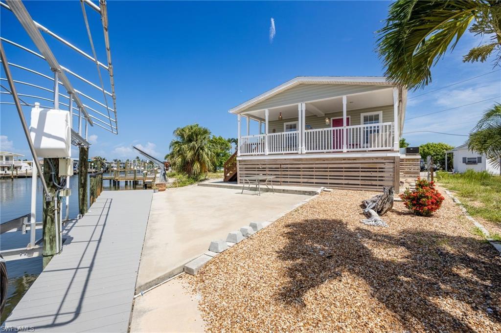 Image 2: Canal front dock and boat lift for easy fun on the water.