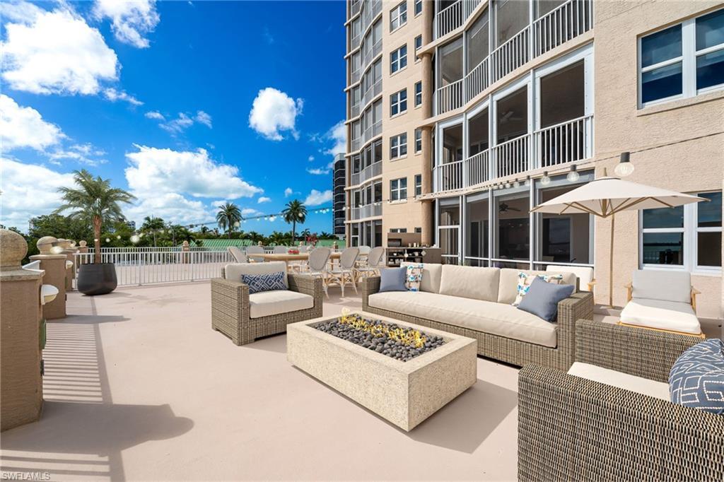 Image 3: View of priate patio / terrace virtual fire pit for marketing.