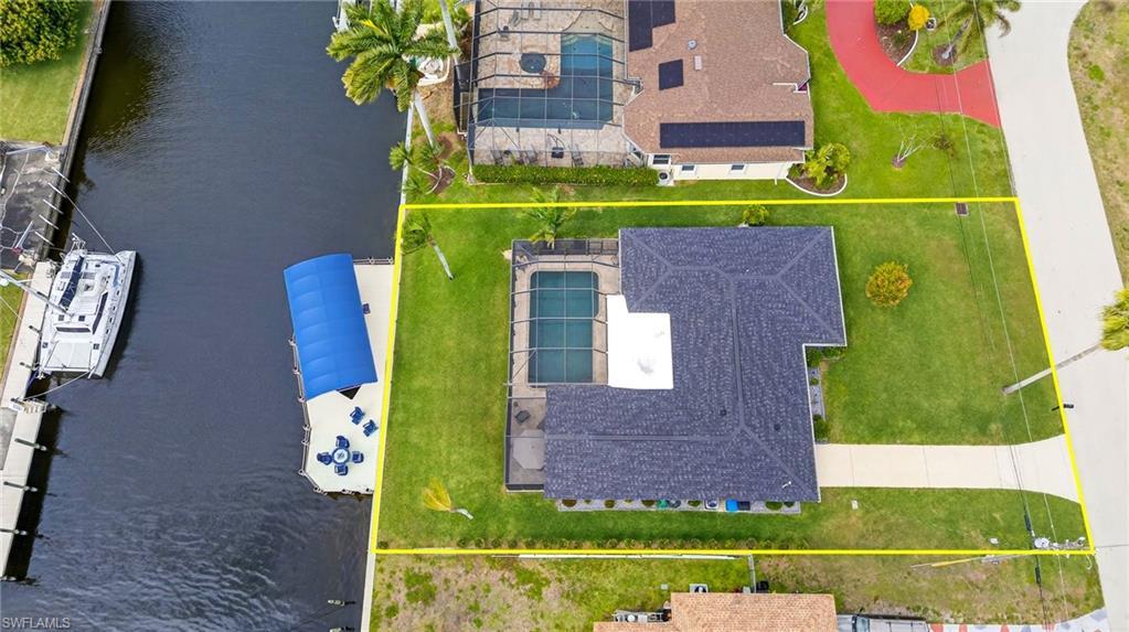 Image 1: Newer composite dock, Canopy, and 13,000 lb boat lift. Seating area 20x25 for relaxing and enjoying the view! Straight access to open water!