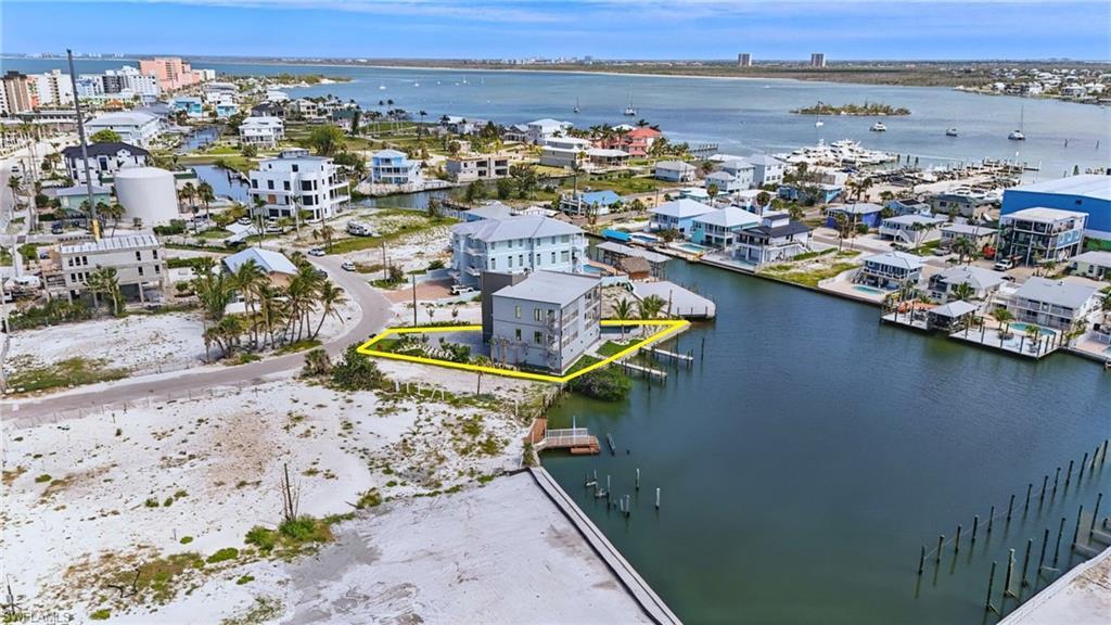 Image 3: Bird's eye view of property on lagoon - VIRTUALLY EDITED