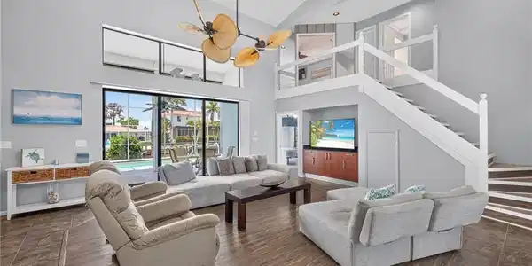 Image 3: Large open living area with ultra high ceilings