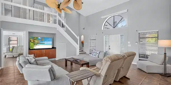 Image 4: Large open living area with ultra high ceilings