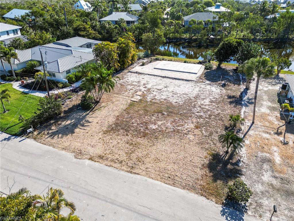 Image 4: Aerial view of lot. Steps to private beach access.