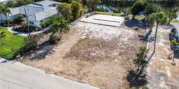 Image 4: Aerial view of lot. Steps to private beach access.