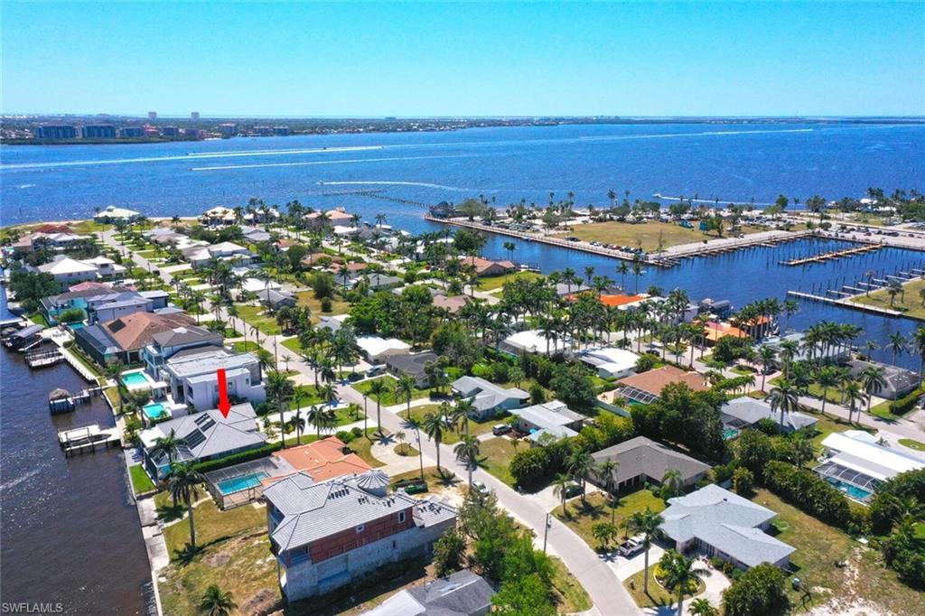 Image 2: AERIAL OF HOME SHOWING CLOSE PROXIMITY TO THE YACHT CLUB & BEACH
