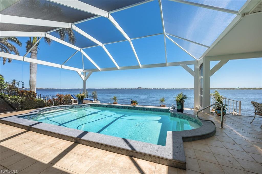 Image 3: POOL OVERLOOKING RIVER