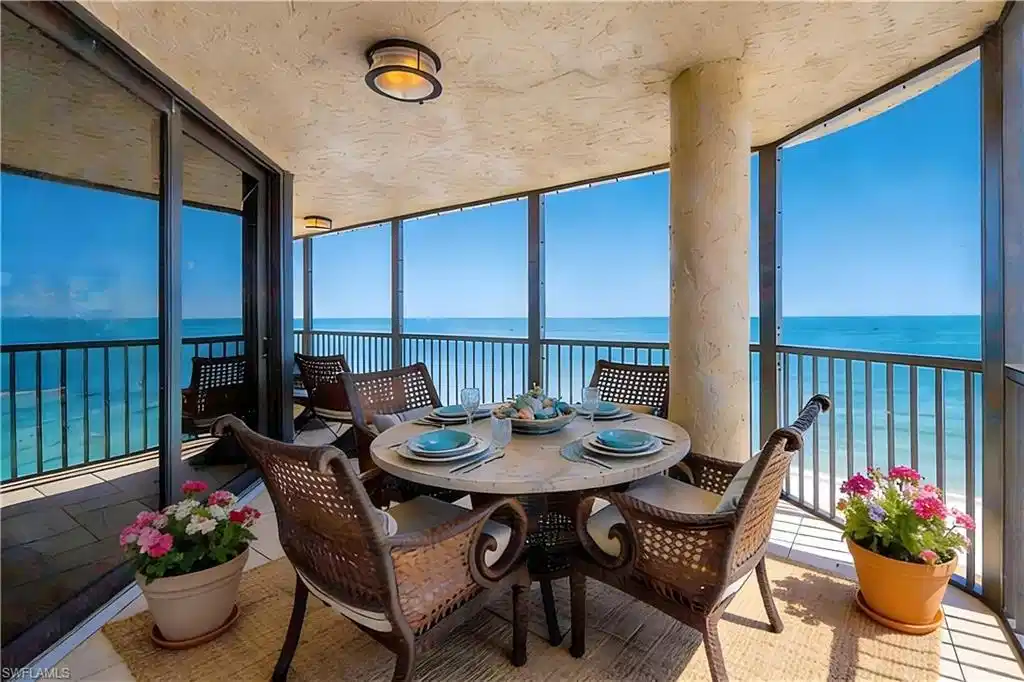 Image 1: Curved balcony with expansive water scenery