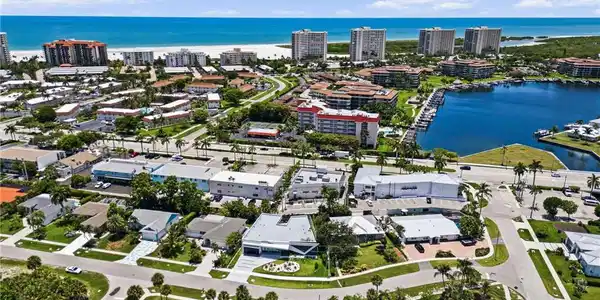 Image 3: Aerial perspective showcasing a coastal community with prominent water features