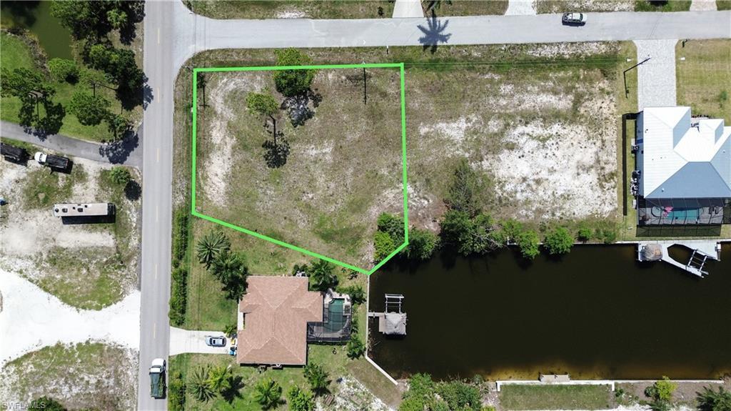 Image 4: Canal-front lot featuring direct water access