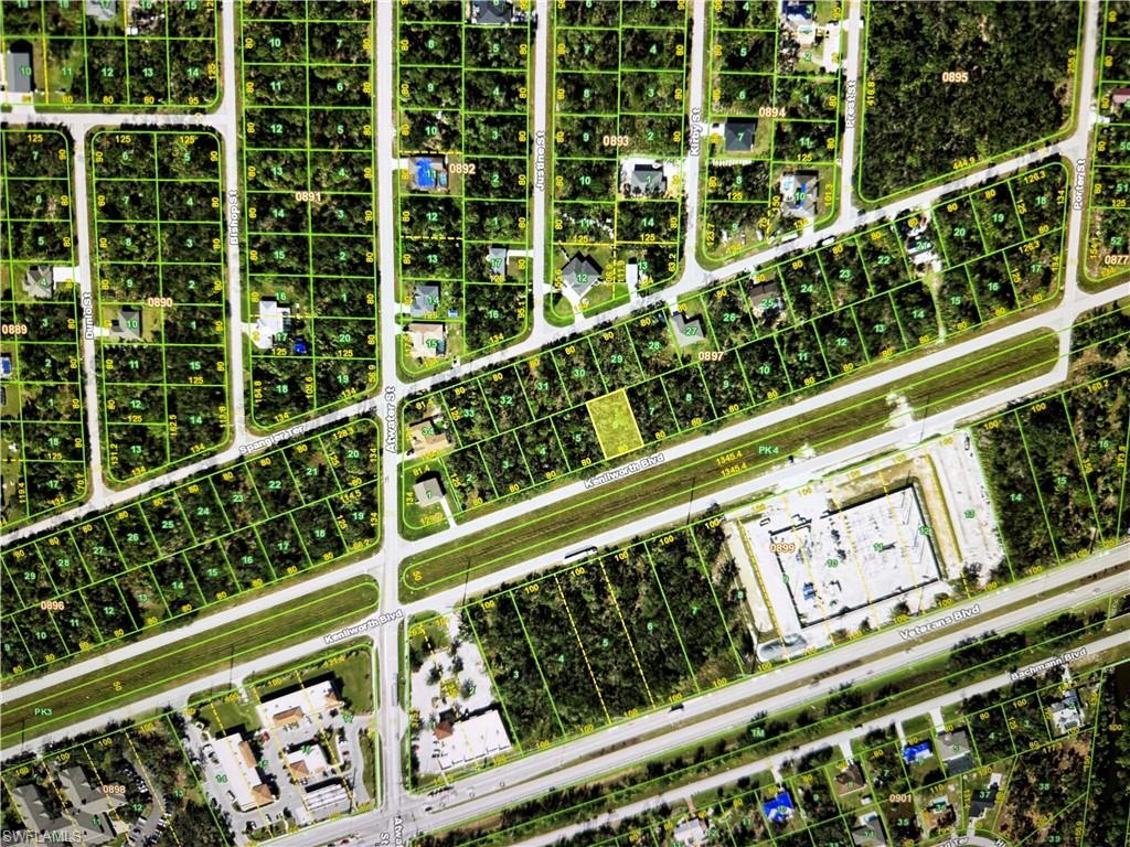 Image 2: Aerial overview of property's location featuring property boundaries highlighted