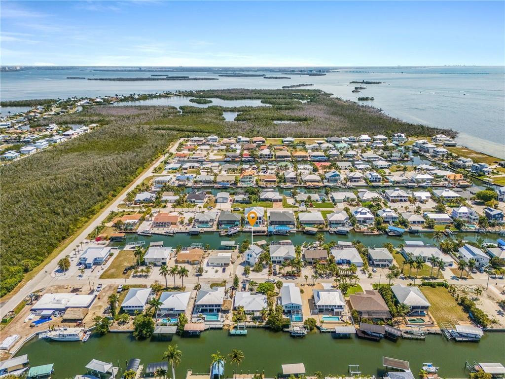 Image 4: This home is only minutes from the ICW and the Gulf.  Ft. Myers Beach, Sanibel and the Gulf are in the background.